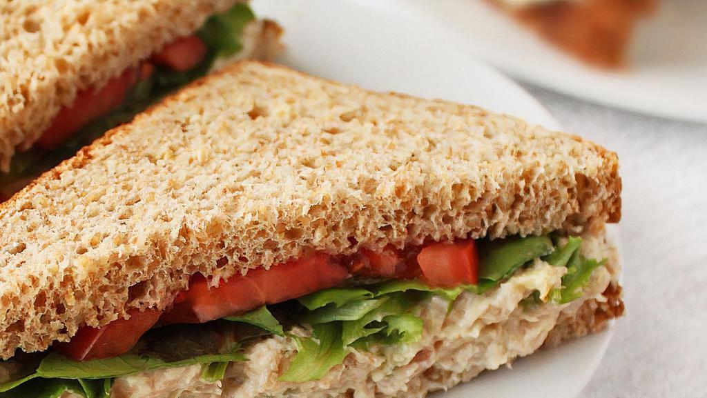 White Chicken Salad Sandwich · All white chicken seasoned and blended with special sauce.