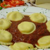 6 Cheese Ravioli · Six great cheeses, including ricotta, stuffed in oversize ravioli pasta shells and baked in ...