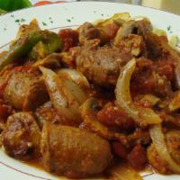 Sausage Fettuccine · Spicy Italian sausage with black olives, green and red peppers, onions, mushrooms and spices...