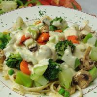 Fettuccine Primavera · Garden fresh vegetables and mushrooms in a creamy vin blanc alfredo sauce.