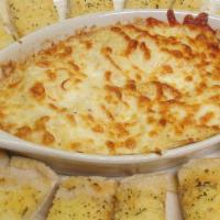 Jumbo Lump Crab Dip · Delicious jumbo lump crab meat blended with cream cheese and our famous seasonings. Served w...