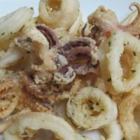 Calamari Italiano · Fried tender calamari rings served with our marinara sauce.