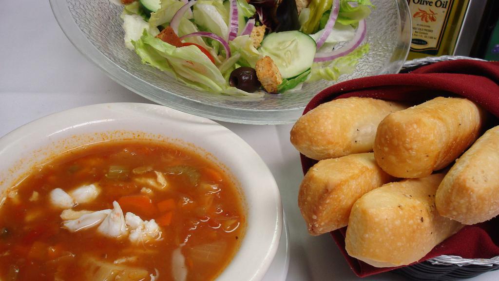 Soup & Salad Extravaganza · Our bountiful garden salad, hot garlic bread sticks, and our homemade soup of the day. Substitute the soup of the day for French onion, cream of crab or Maryland crab for an extra charge per bowl.