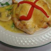 Chicken Imperial · Tender chicken breast topped with our special crab imperial with mushroom wine sauce. Served...