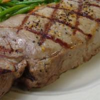 Ny Strip Steak (14 Oz) · A choice 14 oz. Steak, grilled to perfection. Served with choice of one side.
