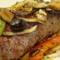 Steak Italiano · A 14 oz. choice NY strip steak, with mushrooms, onions and green and red peppers in a wine, ...
