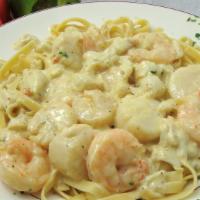 Seafood Fettuccine · Jumbo lump crab meat, scallops and shrimp in alfredo sauce. Served over fettuccine.