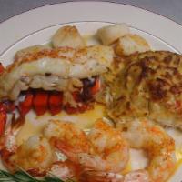Og'S Supreme Seafood · A four oz mini lobster tail, jumbo lump crab cake, large shrimp and scallops. Broiled in lem...