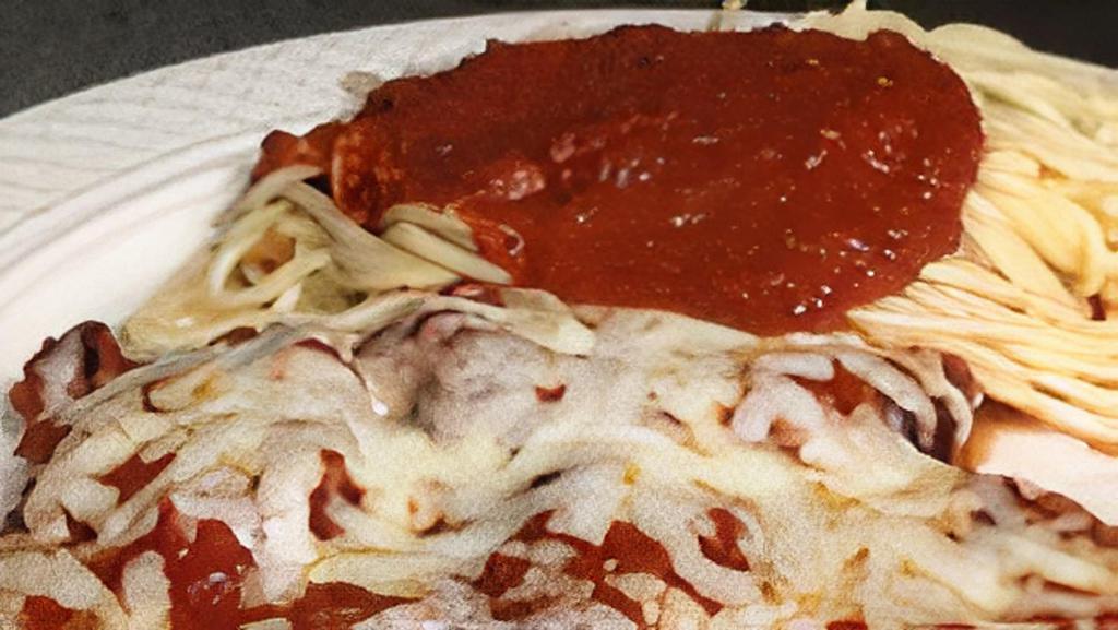 Eggplant Parmigiana · Fresh slices of eggplant, lightly breaded and sauteed. Baked in marinara sauce and topped with mozzarella. Served with side pasta marinara.