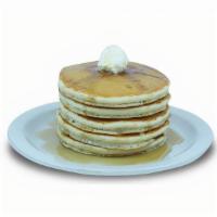 Protein Buttermilk Pancakes · Protein fluffy buttermilk pancakes. Topped with real butter and served with syrup.