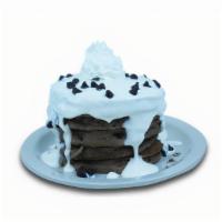 Chocolate Marshmallow · Chocolate pancakes filled with chocolate chips. Topped with our special marshmallow icing, w...