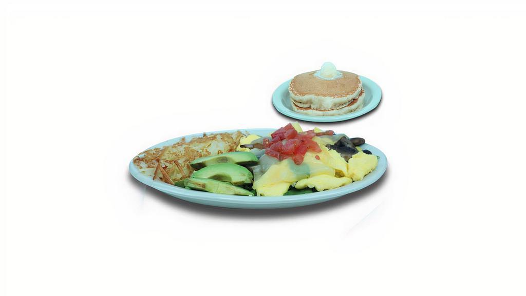Spinach & Mushroom · Scramble mixed with spinach, mushrooms, onions, avocado, tomatoes and Swiss cheese. Served with hash browns and two fluffy pancakes. 1190 - 1290 calories.