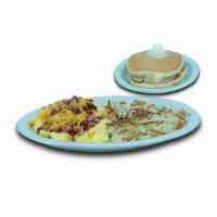 Ham & Cheese · Scramble stuffed with ham, Cheddar cheese and American. Served with golden hash browns and t...