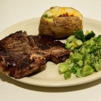 T-Bone Steak Dinner · 12oz Seasoned T-Bone Steak
Served with 2 sides of your choice.
