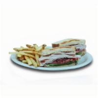 Turkey Club Sandwich · Turkey breast, bacon, lettuce, tomato and mayo on white toast. 1120 calories.