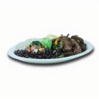 Steak Fajita Dinner · Slices of beef steak mixed with onions, bell peppers and avocado with two sides of your choi...