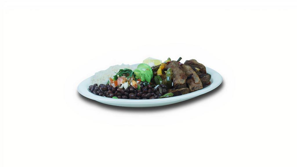 Steak Fajita Dinner · Slices of beef steak mixed with onions, bell peppers and avocado with two sides of your choice and flour tortilla. 440 - 490 calories.