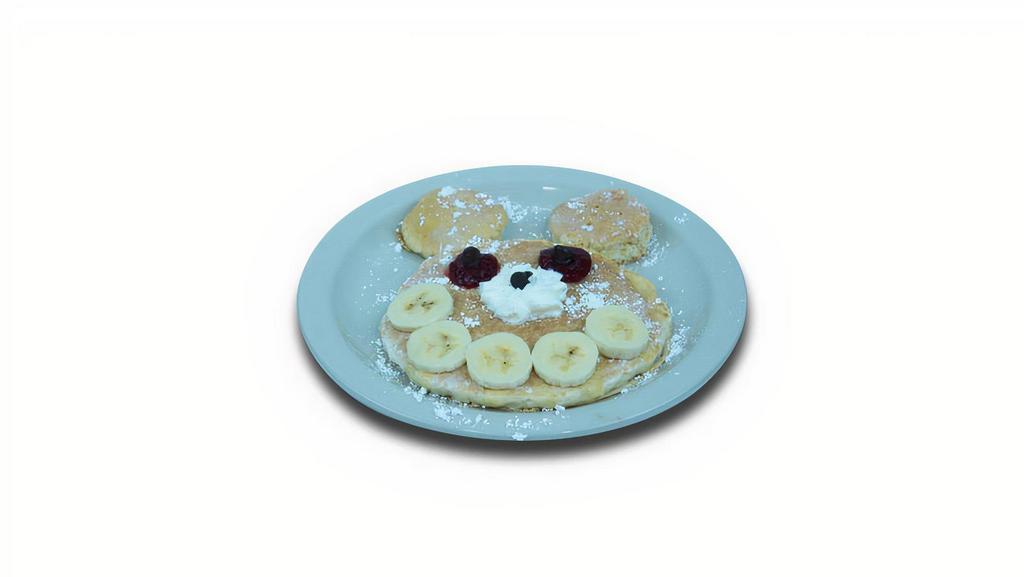 Ted'S Pancake · Topped with powdered sugar, fresh banana slices, strawberry glaze, whipped cream and a blueberry.