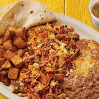Migas · Two scrambled eggs, chorizo, pico de gallo, and tortilla strips. Served with refried beans, ...