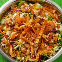 Grilled Shrimp Salad  · Grilled shrimp served on a fresh lettuce blend topped with tomatoes, onions, shredded cheese...