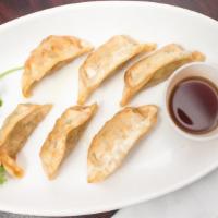 Fried Dumplings (6 Pcs) · Fried dumplings (with chicken and vegetable filling). Comes with special dumpling sauce.