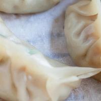 Steamed Dumplings (6 Pcs) · Steamed Dumplings (with chicken and vegetables inside). Comes with dumpling sauce.