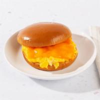 Egg And Cheese Breakfast Sandwich · Two eggs with melted cheese on your choice of bread.