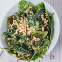 Crispy Baby Spinach  · Roasted pine nuts & pumpkin seeds “contains nuts.”