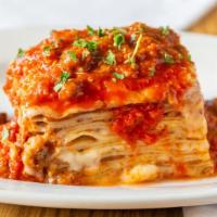 Marini'S Lasagna Bolognese · Layers of fresh pasta, bolognese meat sauce, blend of three cheeses.
