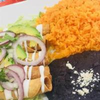 Flautas · Five deep-fried corn tortillas stuffed with chicken, topped with shredded lettuce, sour crea...