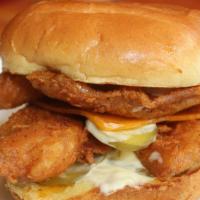 Nashville Hot Fried Fish'N Sandwich · 2 Pc Fried Fish Fillet, Cheddar Cheese, Tartar Sauce & Pickles.