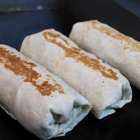 California Burrito · Your choice of meat, fries, nacho cheese, pico, sour cream and guacamole.