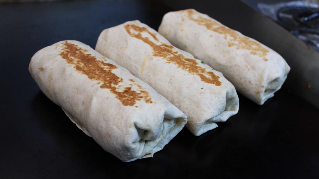 Breakfast Burrito · Scramble eggs, hash browns, beans, and cheese.