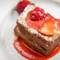Stuffed French Toast · Gluten-free pound cake filled with marscarpone cheese, topped with a strawberry glaze and wh...