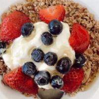 Granola & Yogurt · Gluten-free granola topped with a dollup of greek yogurt and fresh berries, and drizzled wit...