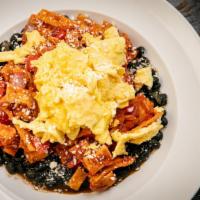 Mean Migas Bowl · Grilled chicken, bell peppers and onions sauteed in salsa, served on a bed of black beans, a...