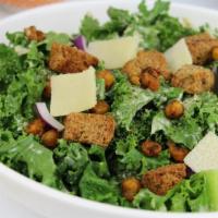 Kale Caesar Salad · kale, roasted chickpea, parm cheese in-house-made croutons with caesar dressing
