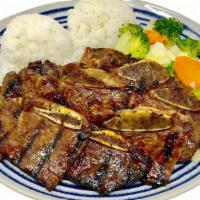 Rib Teriyaki · 9 pieces of Korean-style marinated short ribs. Comes with two scoops of steamed rice and ste...