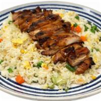 Chicken Fried Rice · Stir-fried rice mixed with vegetables (corn, green bean, string beans, carrots, and egg) and...