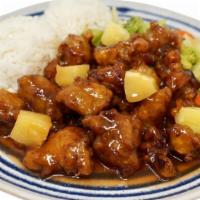 Sweet And Sour Chicken · Crispy, deep-fried chicken topped with sweet and sour sauce and pineapple chunks. Comes with...