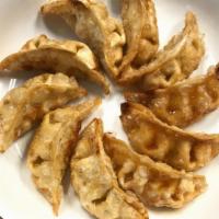 Gyoza (10Pc) · 10 pieces of deep-fried gyoza (chicken and vegetable potstickers). Served with sweet and sou...