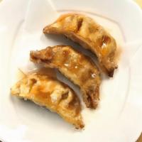 Gyoza (3 Pcs) · 3 pieces of deep-fried gyoza (chicken and vegetable potstickers). Served with sweet and sour...