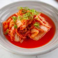 Small Side Kimchi · Side of Korean-style spicy pickled cabbage.