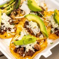 Street Tacos  · 5 mini tacos of the meat of your choice with avocado and cheese