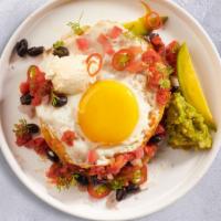 Nuevos Huevos Rancheros · Two eggs any style topped with our home made ranchero sauce.