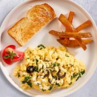 Poblano Huevos · Two eggs scrambled with roasted poblano and onions, topped with melted jack cheese.