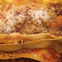 Lasagna Alla Bolognese · homemade lasagna with organic grass fed ground beef with our tomato sauce ,parmigiano reggiano
