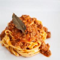 Fettuccina Alla Bolognese · Homemade Fettuccina with organic grass fed  ground beef and our tomato sauce