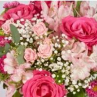 Mother’S Day Bouquet · Fresh bouquet of flowers designed in a clear vase with pink or red flowers in roses, sweethe...