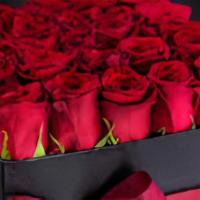 Box Of Roses (12/15 Roses) · Red box of roses with red or pink roses arranged in a  keepsake box.